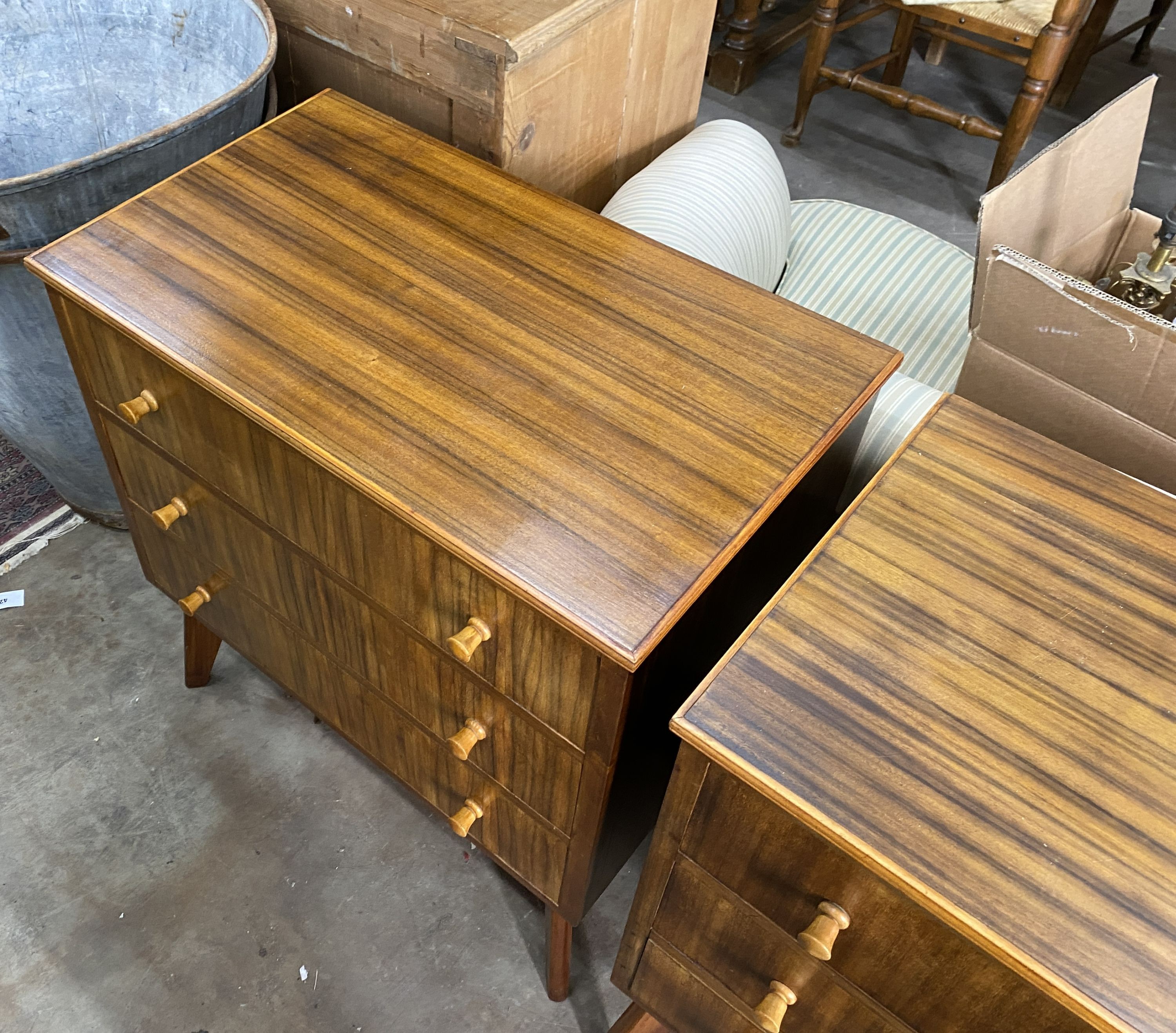 A pair of 1960s Morris Of Glasgow walnut three drawer chests, width 79cm, depth 47cm, height 86cm